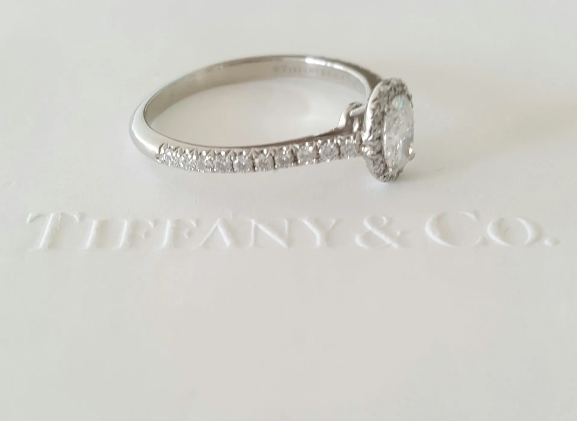 Tiffany & Co. 0.57tcw E/VVS2 Oval Diamond Soleste Halo Engagement Ring